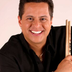 Tito Puente Jr With Drumsticks